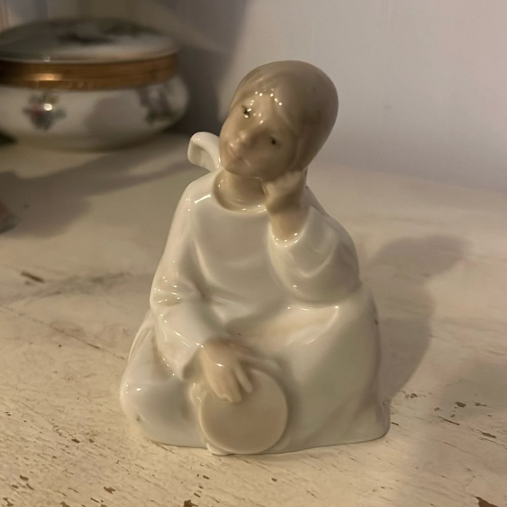 Vintage Lladro sitting boy angel 4” x 3”